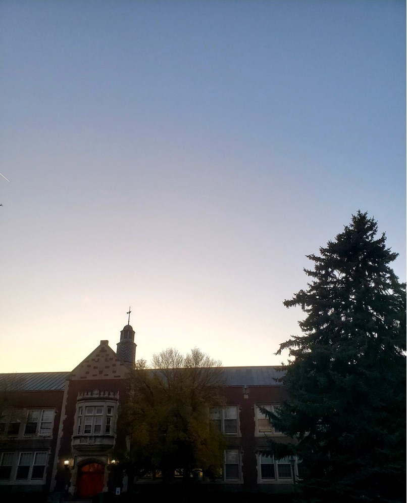 Welles Hall at SUNY Geneseo, seen in near-silhouette